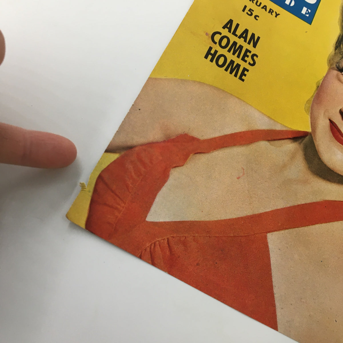 Close-up of the COVER ONLY Movie Stars Parade Magazine February 1944 featuring Betty Hutton. The image highlights a small rip at the corner, showcasing the magazine's vintage condition, perfect for collectors.