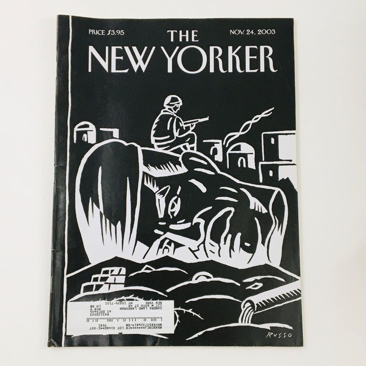 The New Yorker Full Magazine from November 24, 2003, featuring cover art depicting a soldier overlooking a landscape, symbolizing the theme of 'The Occupation' by Anthony Russo.