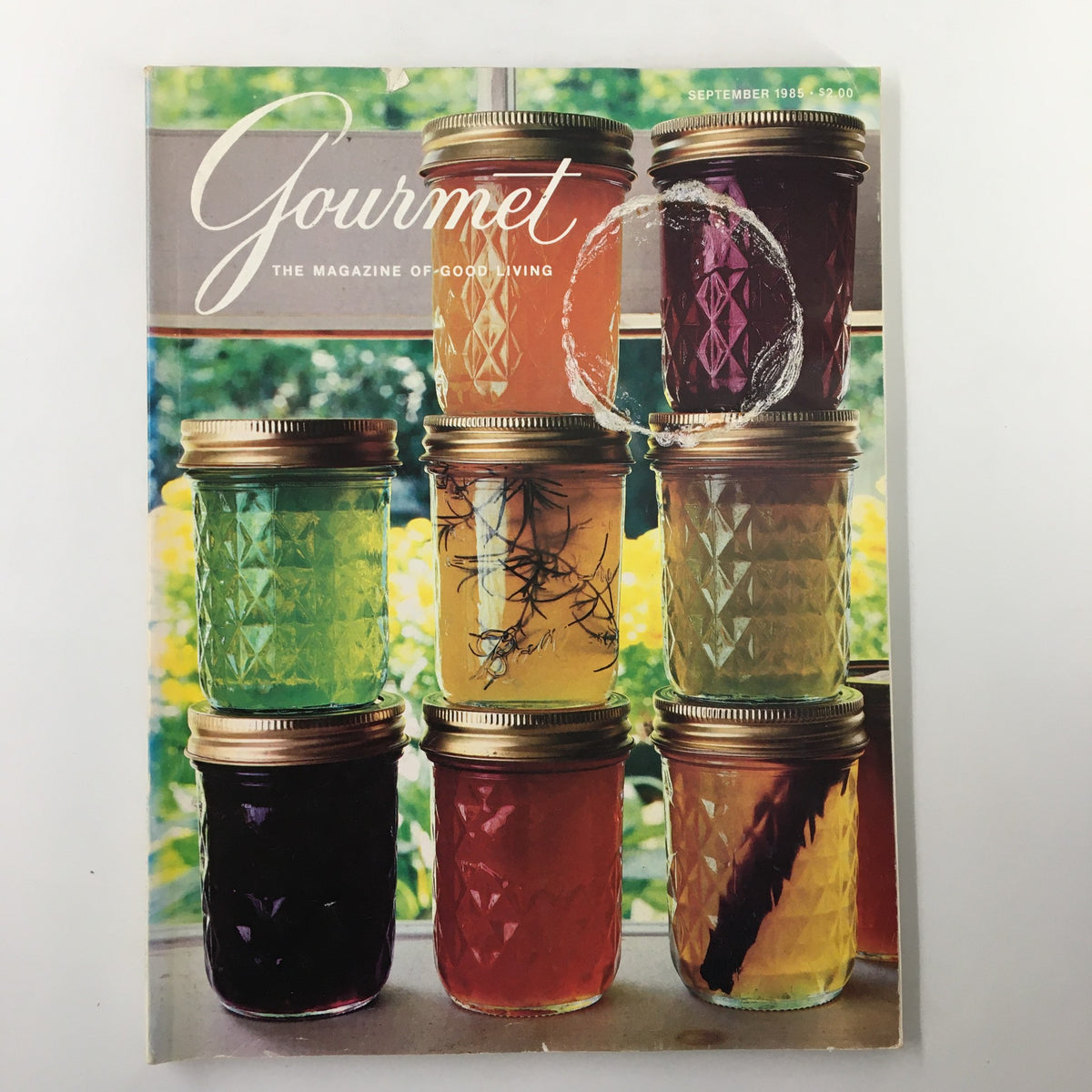 Cover of VTG Gourmet Magazine, September 1985, featuring an array of colorful fruit, vegetable, and herbal jellies in glass jars, representing culinary trends of the 1980s.