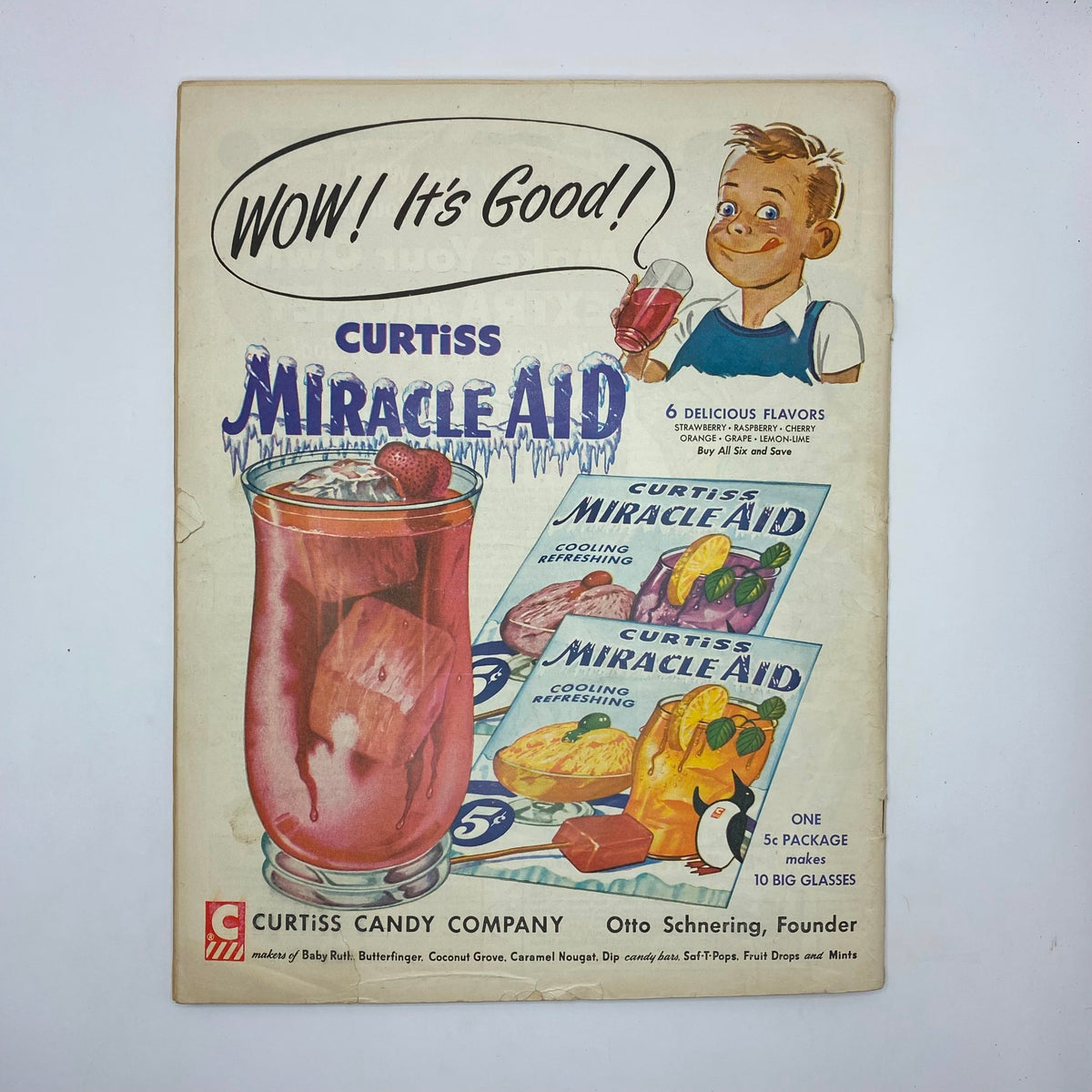 Advertisement for Curtiss Miracle Aid on the back of the June 1954 issue of VTG Boys' Life for All Boys Magazine, showcasing a refreshing beverage with a nostalgic design.
