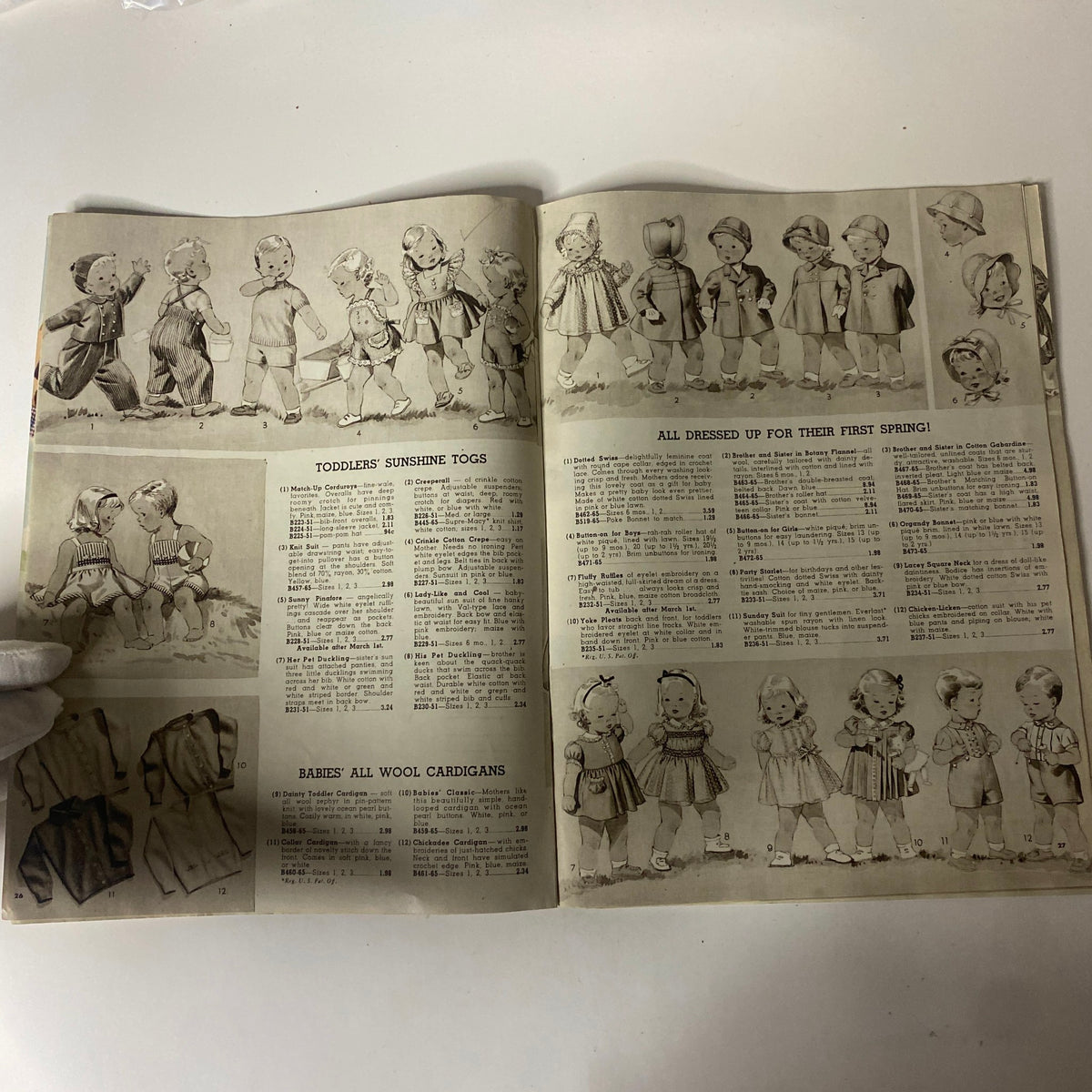 1945 Macy's Spring and Summer Catalog depicting toddlers in sunshine attire, complete with playful illustrations of children's clothing and spring fashion items.