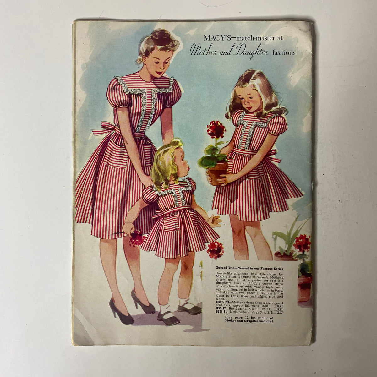 1945 Macy's Spring and Summer Catalog featuring a vibrant cover illustration of mother and daughter in matching striped dresses, symbolizing family fashion.