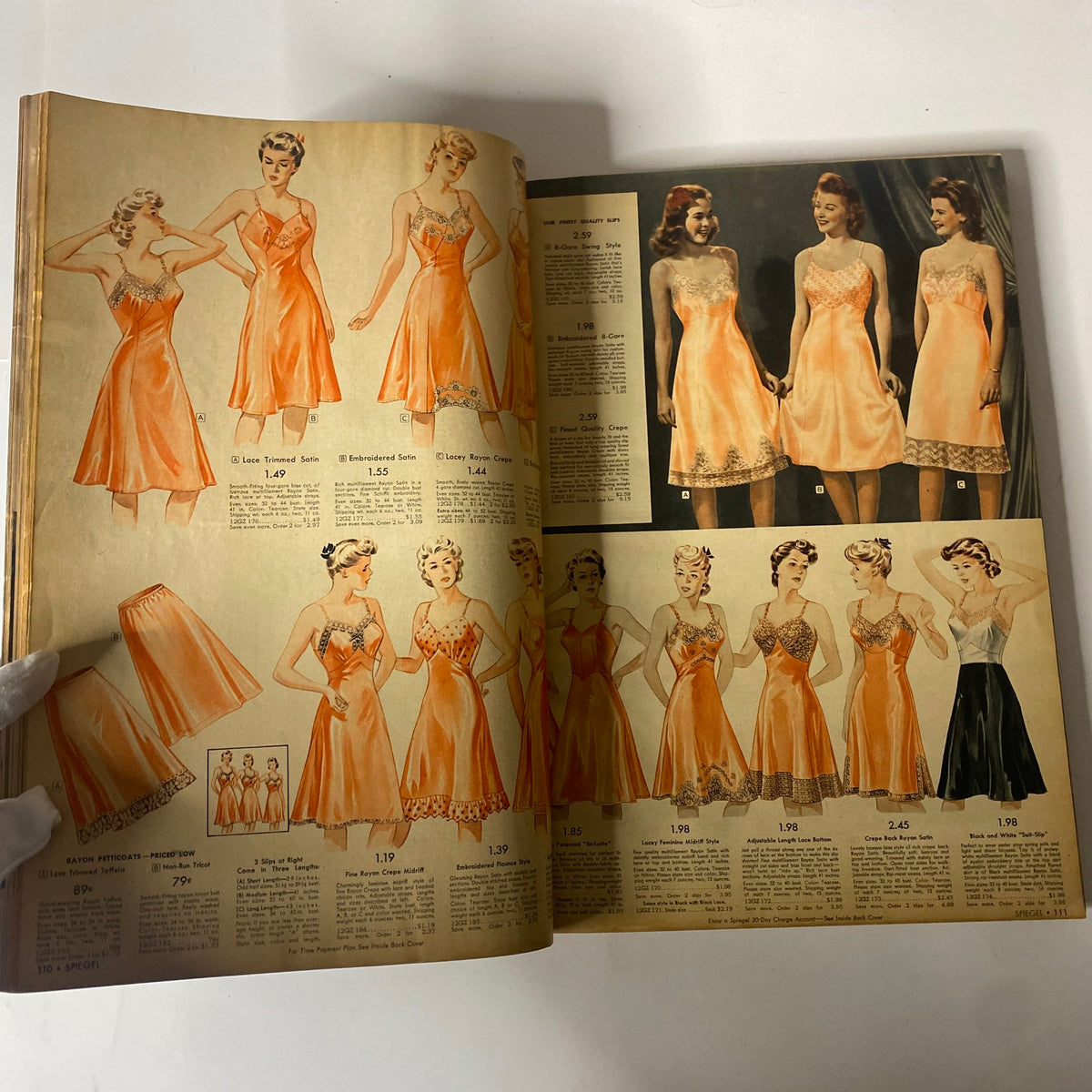 Interior pages of the 1943 Spiegel Spring and Summer Catalog displaying elegant lingerie designs, showcasing vintage styles from the early 1940s.