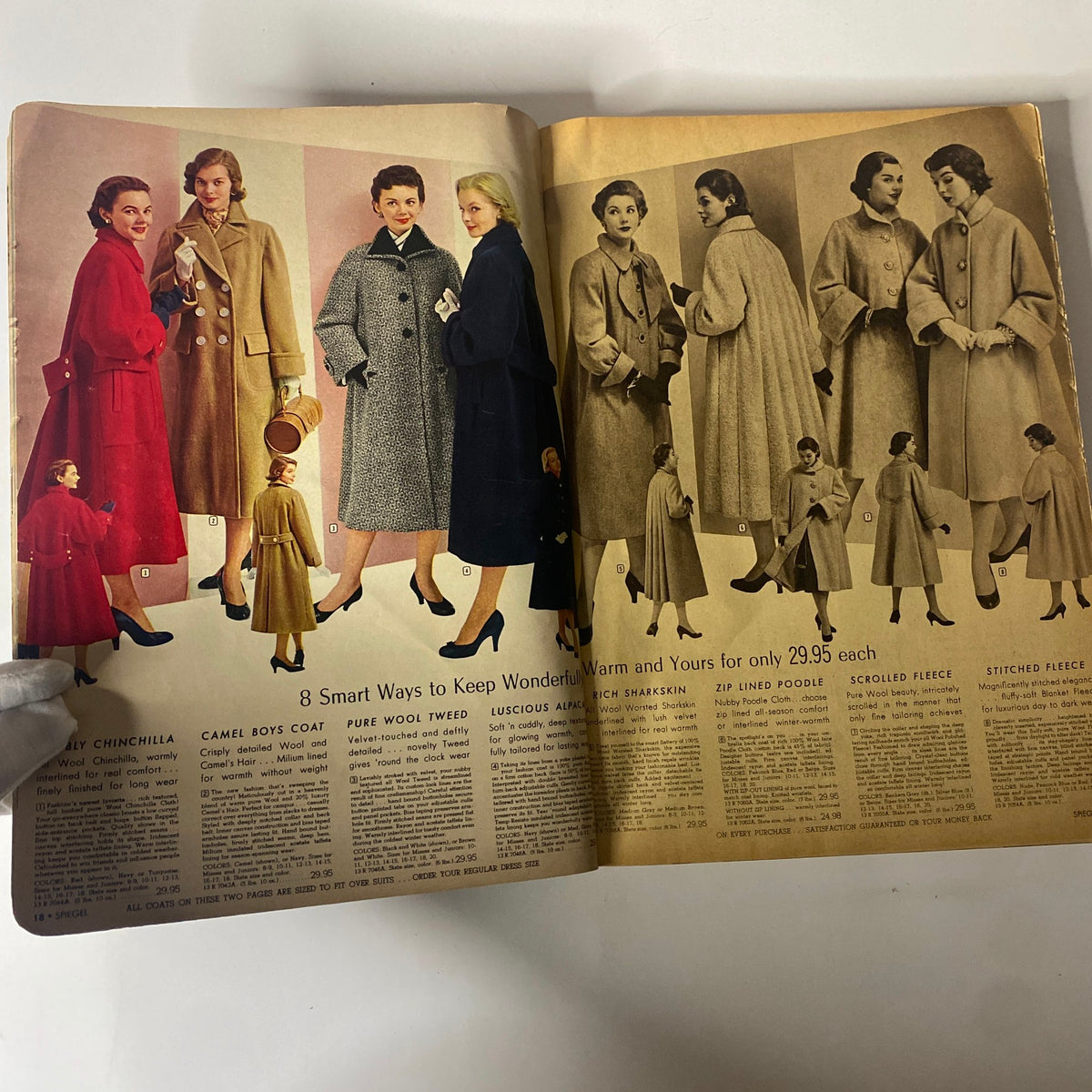 1955 Spiegel Fall and Winter Catalog showcasing a range of stylish winter coats on models, highlighting trends for the colder season.