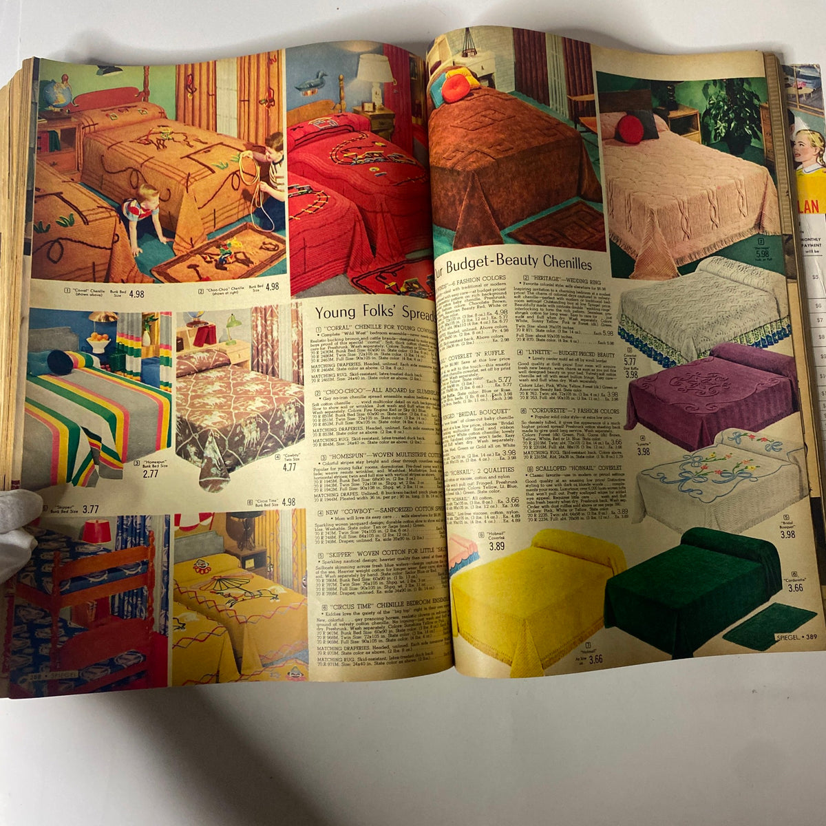 Interior page of the 1955 Spiegel Fall and Winter Catalog showcasing colorful bedspreads and children's bedding options, highlighting trends in mid-century American home decor.
