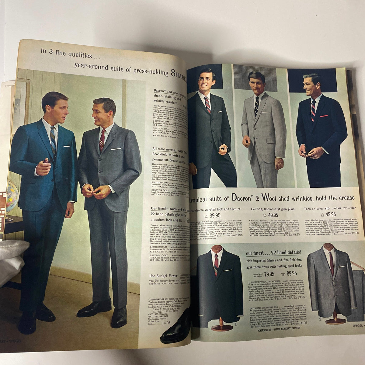 1968 Spiegel Spring and Summer Catalog highlighting men's formal suits, showcasing various styles in tropical and wool fabrics, ideal for year-round wear.