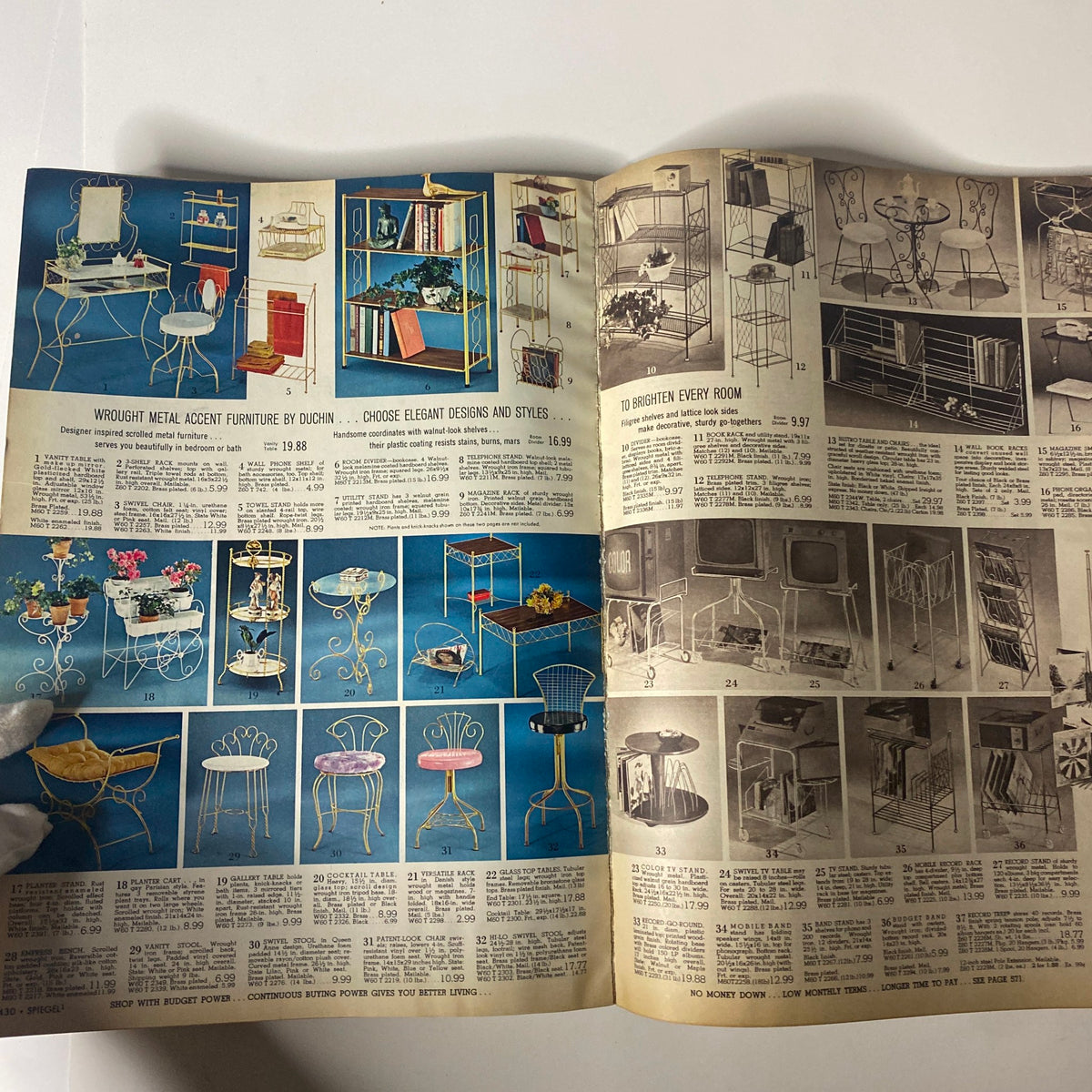 Interior page of the 1968 Spiegel Spring and Summer Catalog showcasing wrought metal accent furniture by Duchin, including tables and chairs in vibrant colors.
