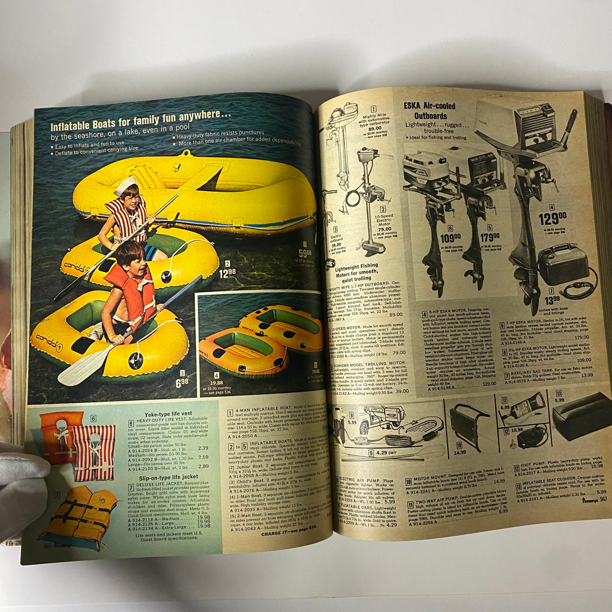 1970 JC Penneys Spring and Summer Store Catalog featuring inflatable boats and outdoor gear, highlighting summer recreational options for family fun by the water.