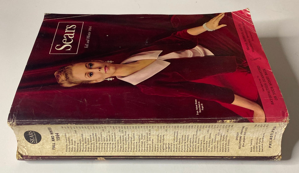 Front cover of the 1970 Sears Fall and Winter Catalog featuring a woman in a stylish red outfit with an elegant collar, showcasing vintage fashion trends.