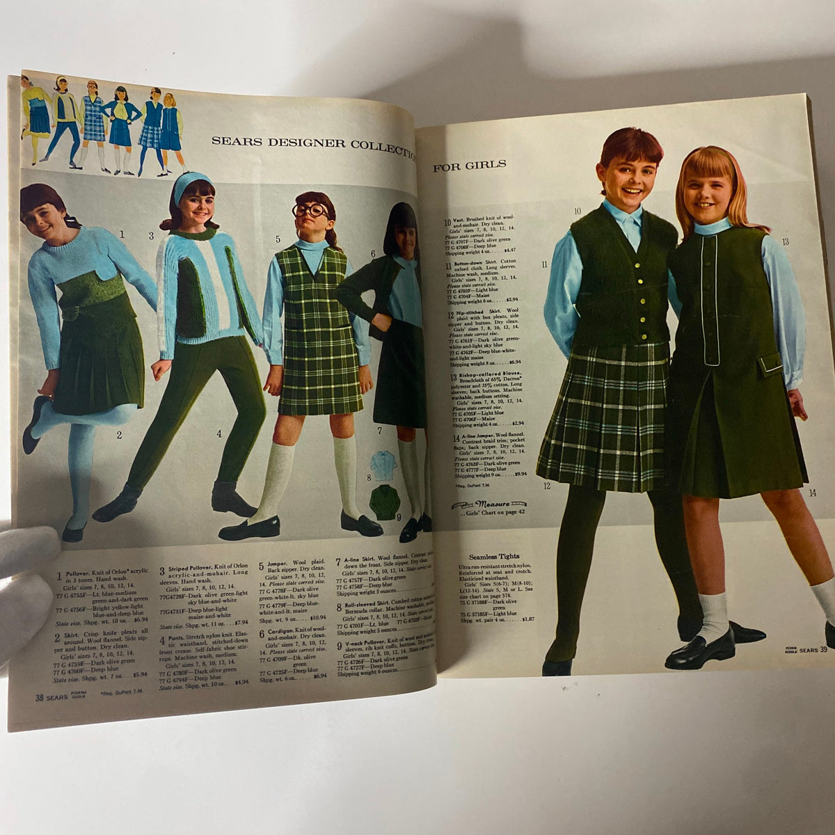 1965 Sears Fall and Winter Catalog showcasing girls' fashion designs including dresses and skirts, with colorful photography and detailed descriptions.