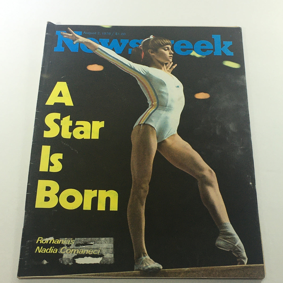 Cover of VTG Newsweek Magazine from August 2, 1976 featuring Nadia Comaneci with the title 'A Star Is Born' showcasing her poised gymnastics pose.