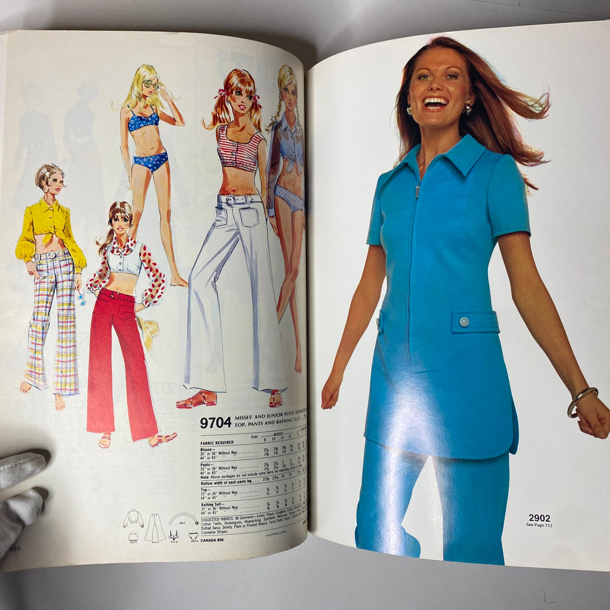 1971 McCall's Christmas Holiday Issue showcasing vintage fashion illustrations including swimsuits, crop tops, and colorful wide-leg pants along with a model wearing a bright blue outfit.