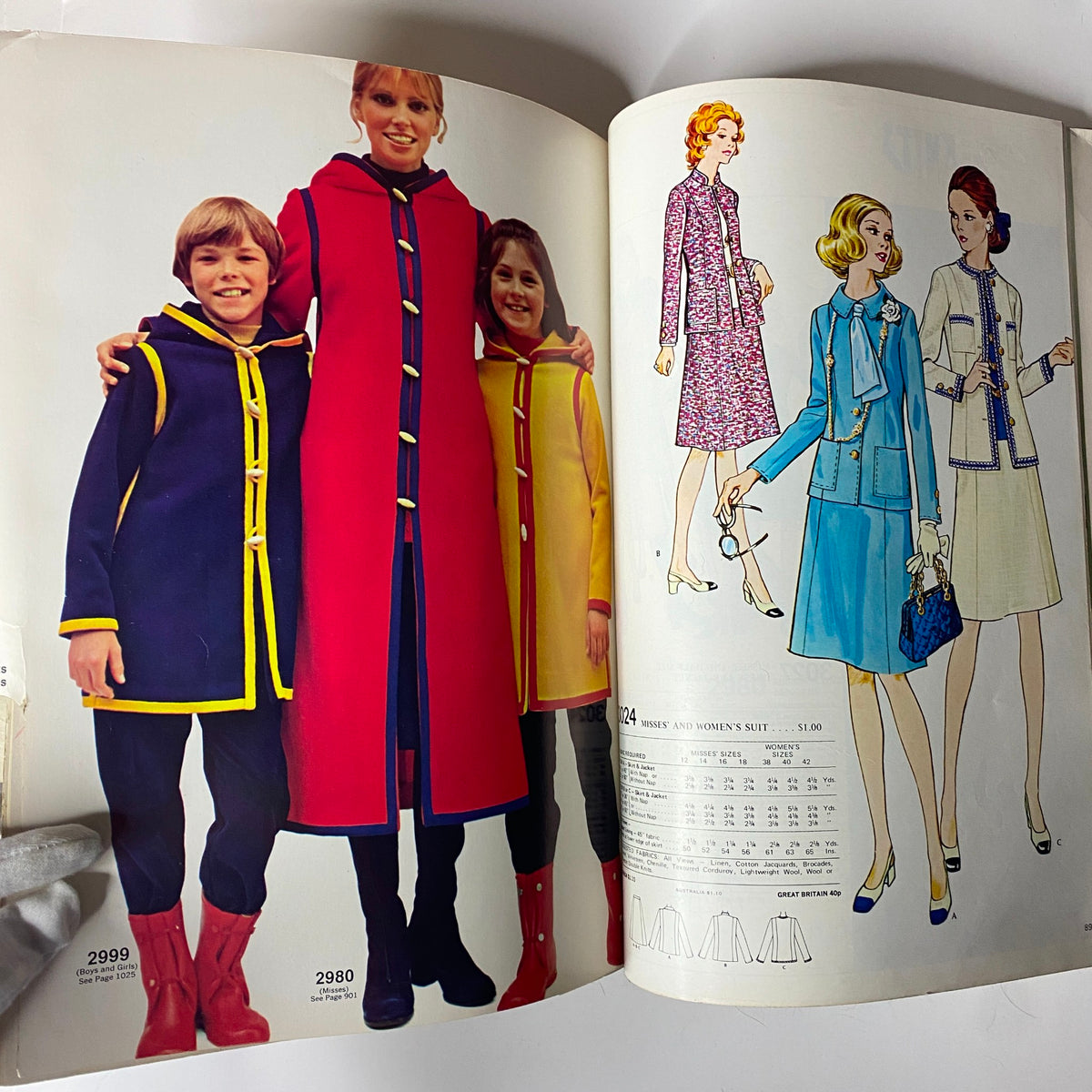 1971 McCall's Christmas Holiday Issue displaying a vintage family photo with children and adults in colorful coats and illustrated options for women's suits.