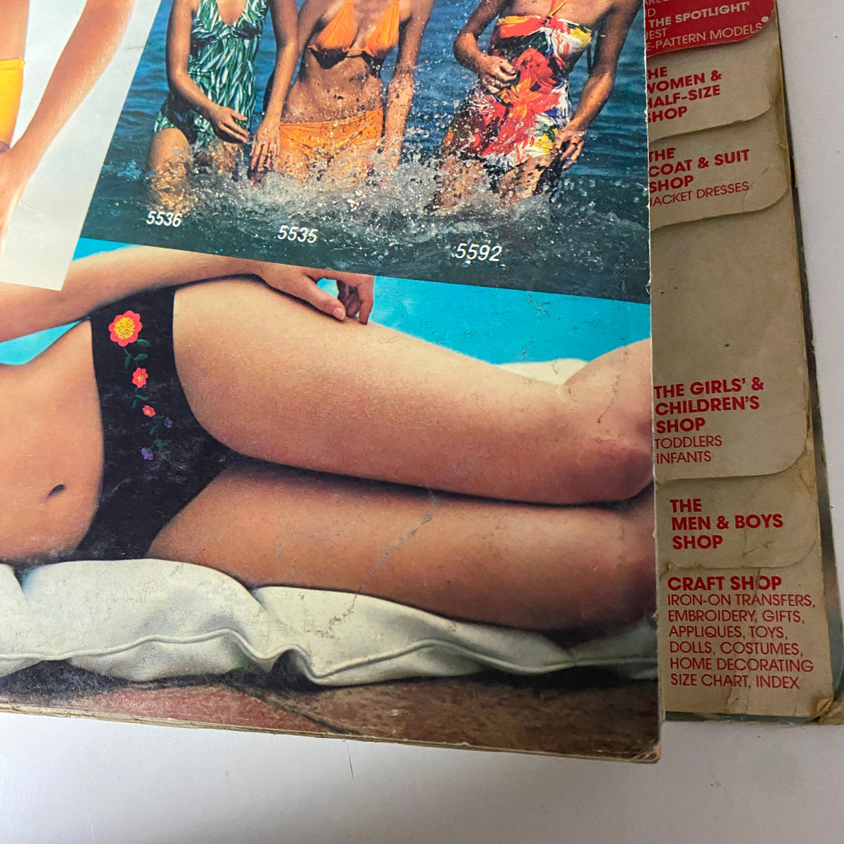 Close-up of the 1977 July Carefree Patterns McCall's Summer Catalog showing several swimsuit designs, capturing the relaxed and vibrant spirit of 1970s summer fashion.