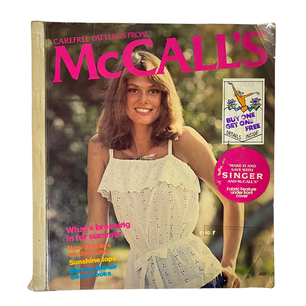 Cover of the 1977 July Carefree Patterns from McCall's Summer Catalog featuring a woman wearing a white summer top.