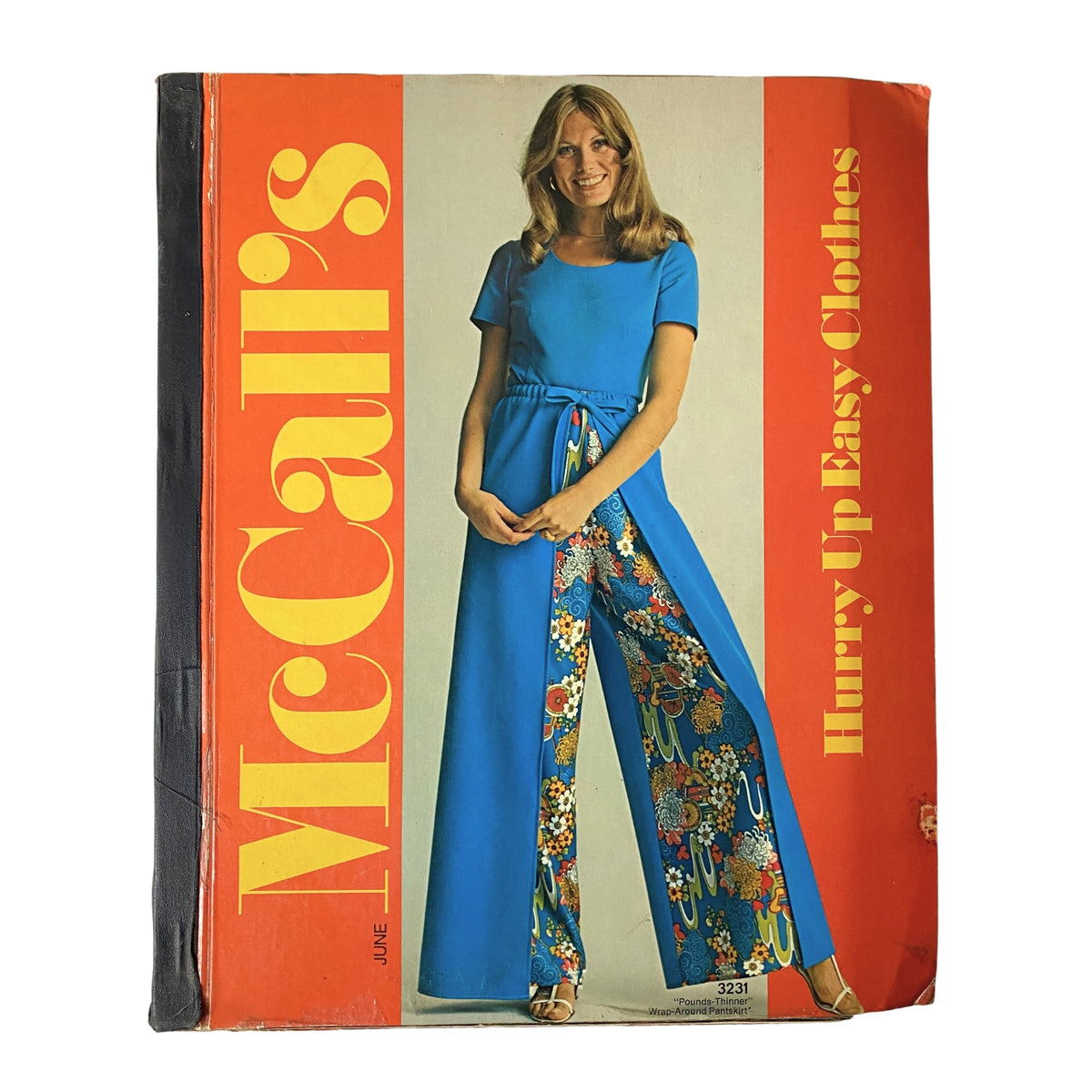 1970s McCall's Hurry Up Easy Clothes Catalog featuring a model in a blue outfit with colorful patterned pants, showcasing vintage fashion styles from the 1970s.