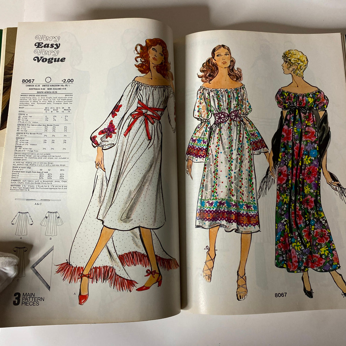 Fashion illustrations from the 1971 July Butterick Vogue Collection Catalog displaying 'Very Easy Very Vogue' patterns, featuring elegant dress designs from the 1970s.