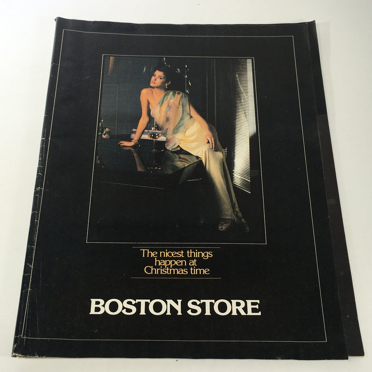 VTG Boston Store Catalog December 1970s featuring a model in elegant attire on the cover, displaying holiday style trends.