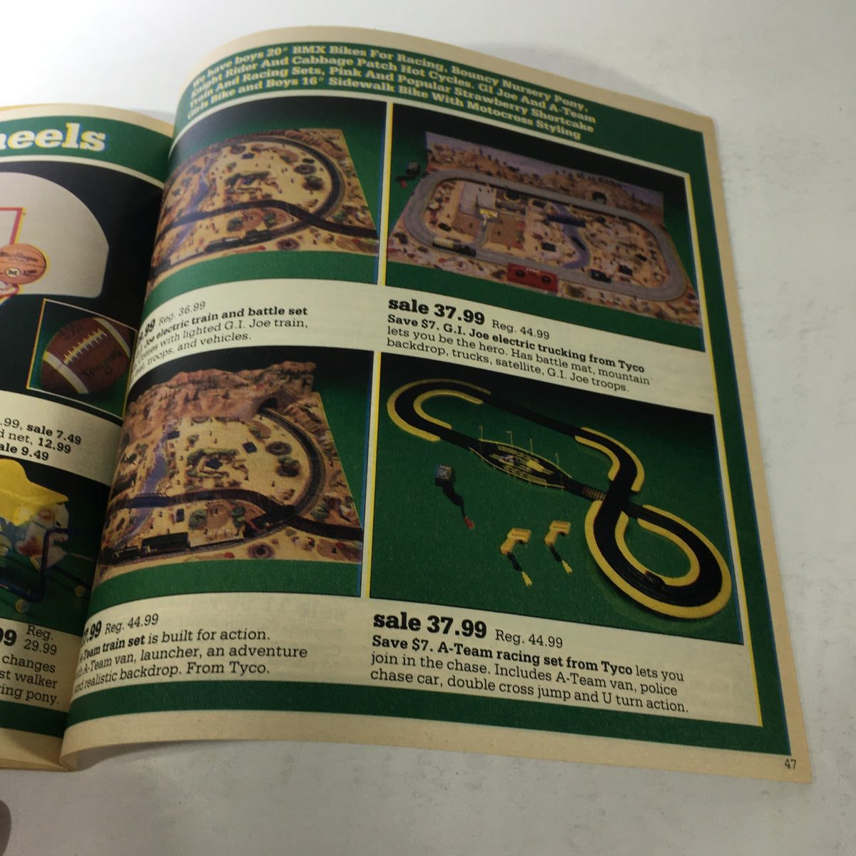 VTG Montgomery Ward Store Catalog: December 1984 promoting a range of toy sets including G.I. Joe and Tyco train sets for kids, highlighting holiday gift ideas.
