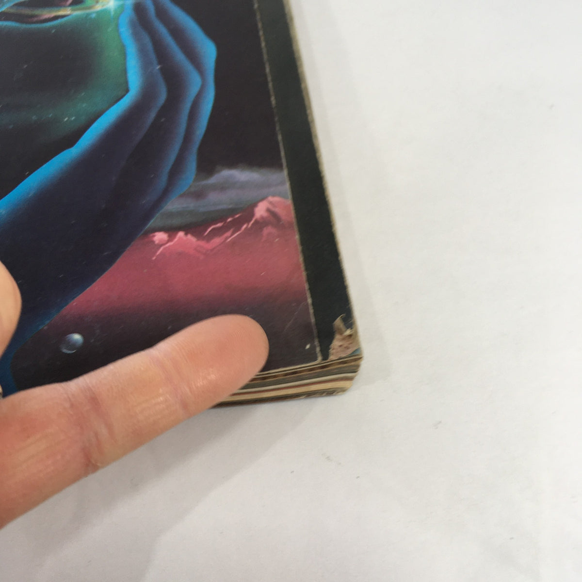 Side view of the spine of Omni Magazine December 1984 displaying minor wear and tear, featuring Arthur C. Clarke's '2010'.