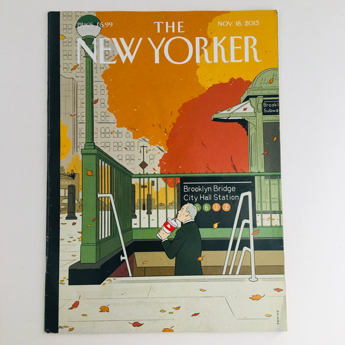 Cover of The New Yorker November 18, 2013 featuring artwork by Adrian Tomine, depicting a man drinking coffee at a subway station with autumn leaves, showcasing the magazine's iconic aesthetic.