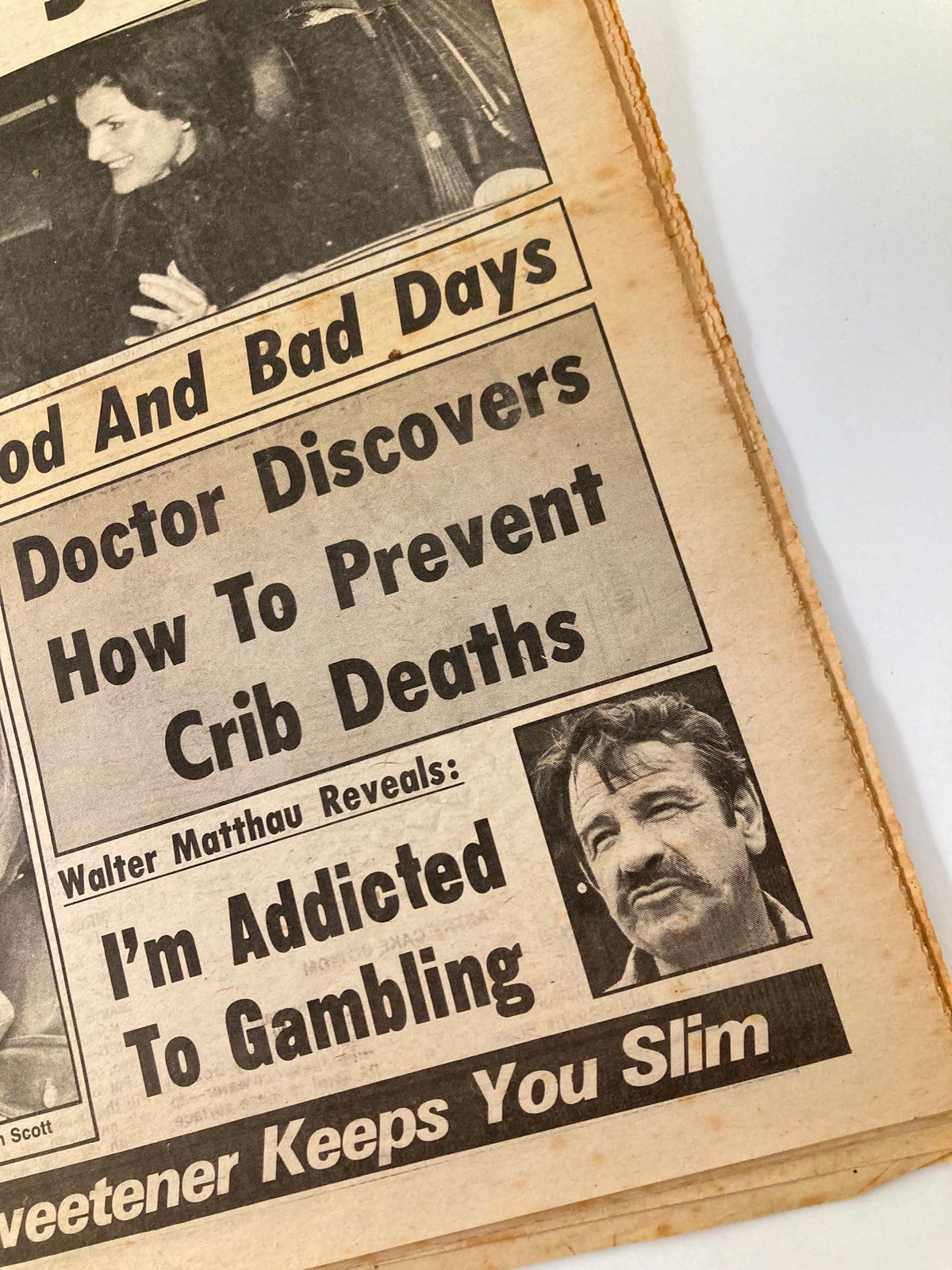 Midnight Tabloid November 22 1976 Vol 23 #22 featuring a close-up of interesting tabloid headlines, including an article by Walter Matthau on gambling.