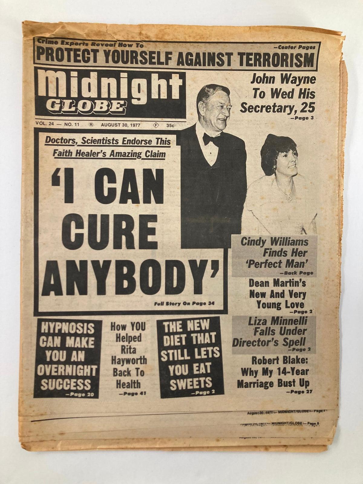 Cover of Midnight Globe Tabloid August 30, 1977, Vol 24 #11 featuring John Wayne and Cindy Williams, highlighting stories on healing claims and celebrity news.
