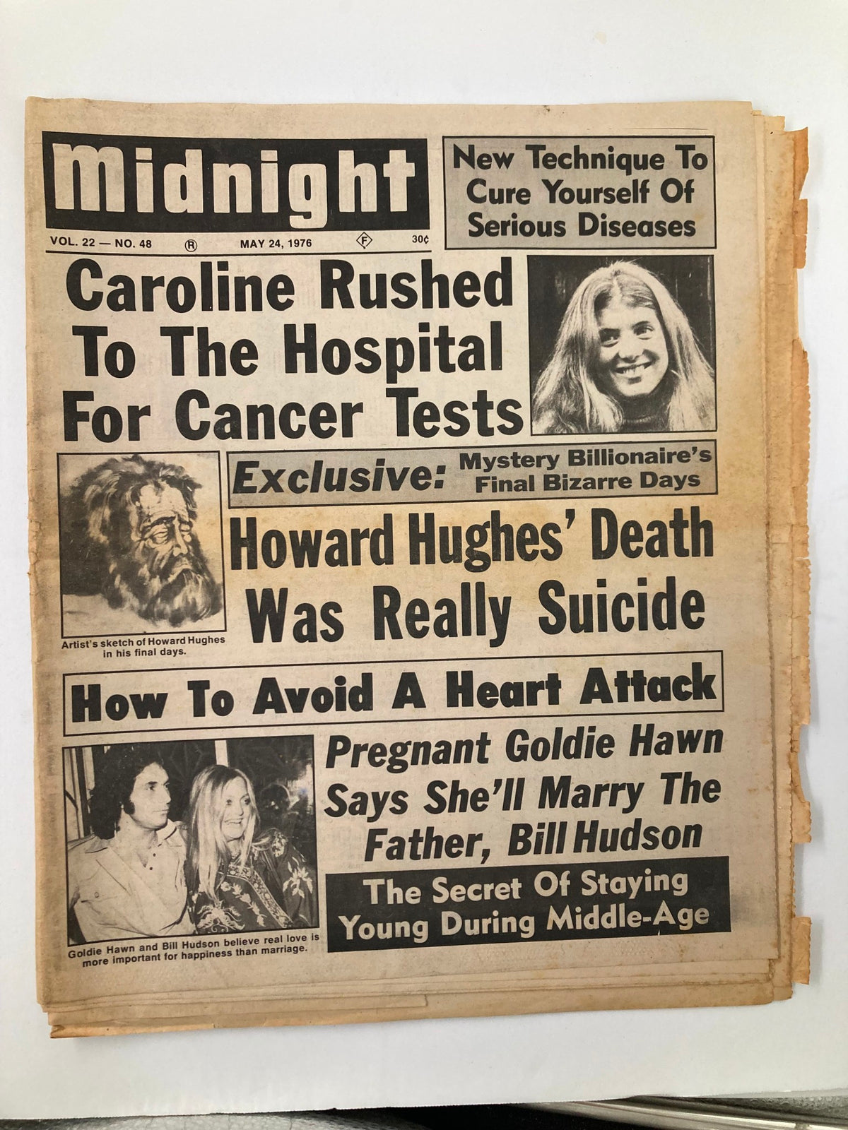 Cover of Midnight Tabloid, May 24, 1976, Vol 22 No 48 featuring headlines about Caroline's hospital visit, Howard Hughes' death, and a story on Goldie Hawn and Bill Hudson.