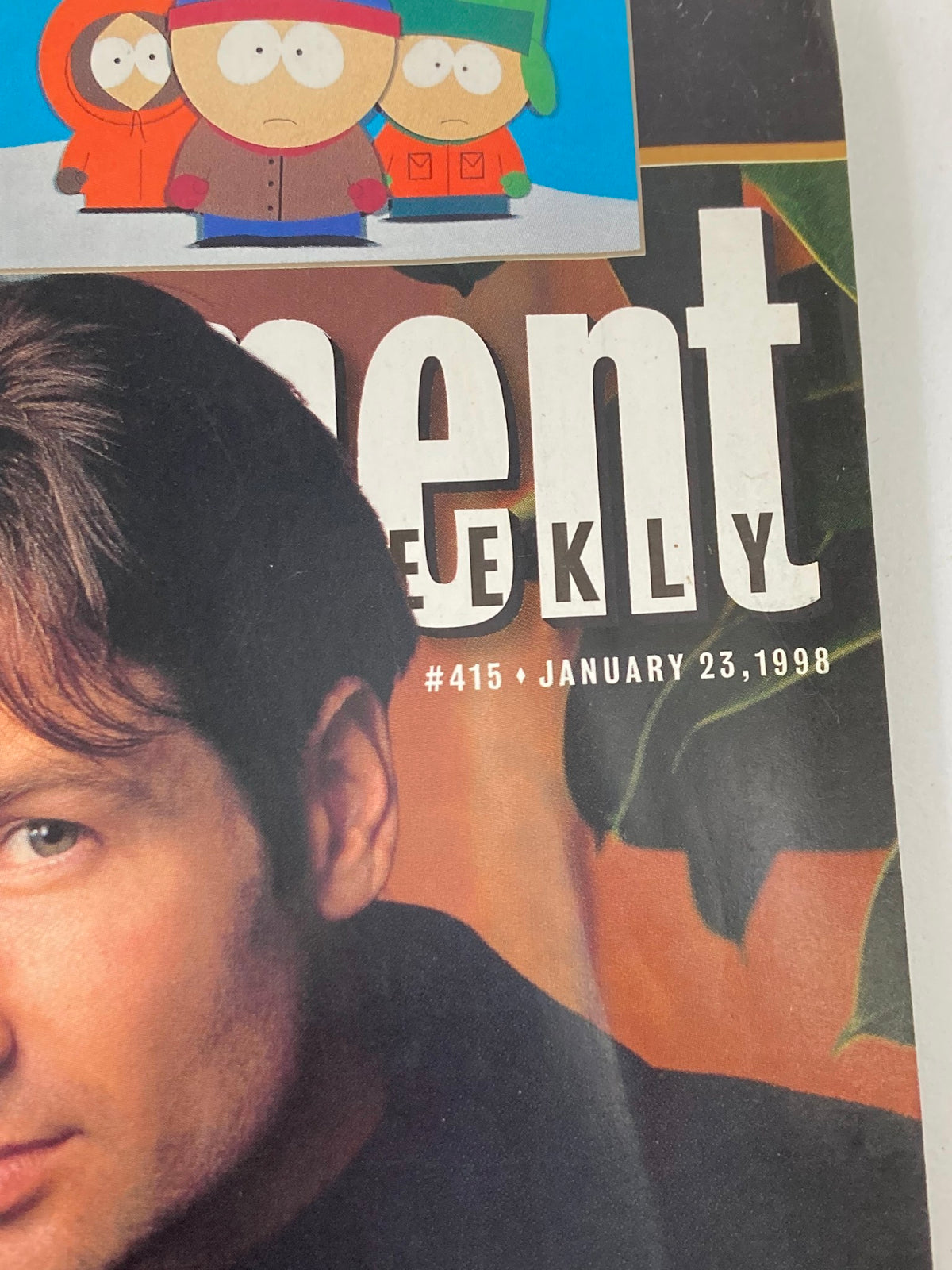 Entertainment Weekly Magazine cover from January 23, 1998, featuring a close-up of a male actor and an illustration of characters from South Park, showcasing the magazine's pop culture focus.