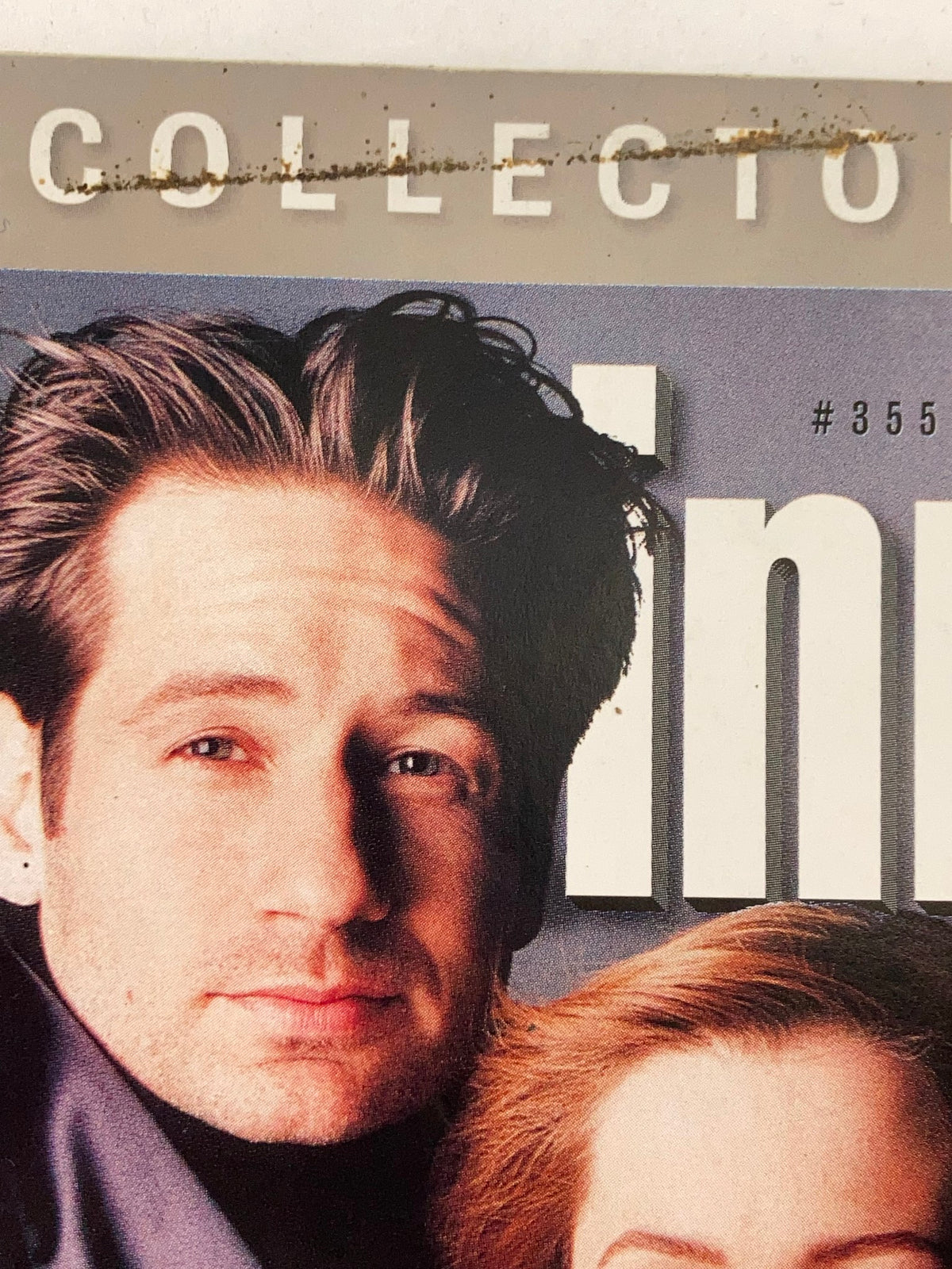 Close-up of David Duchovny featured in Entertainment Weekly Magazine, November 29, 1996.