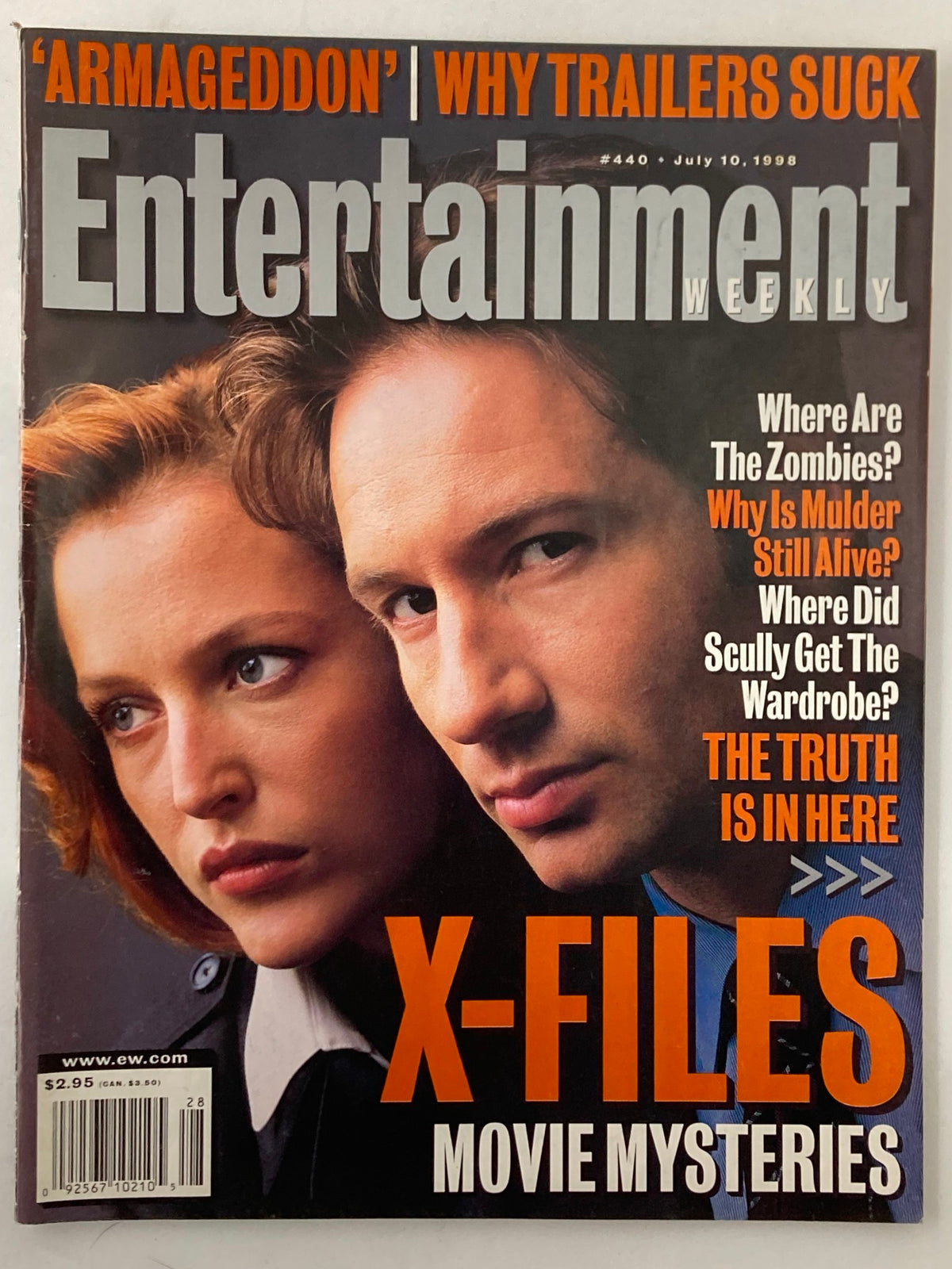 Entertainment Weekly magazine cover from July 10, 1998 featuring Gillian Anderson and David Duchovny, icons of The X-Files, with bold headlines discussing movie mysteries and the show's popularity.