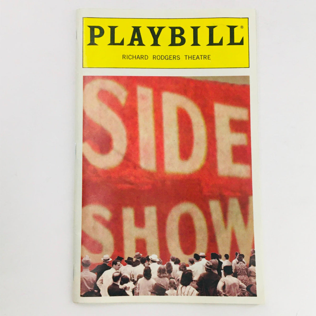 1997 Playbill for Side Show by Robert Longbottom at Richard Rogers Theatre featuring audience silhouettes and the show title prominently displayed in bold.