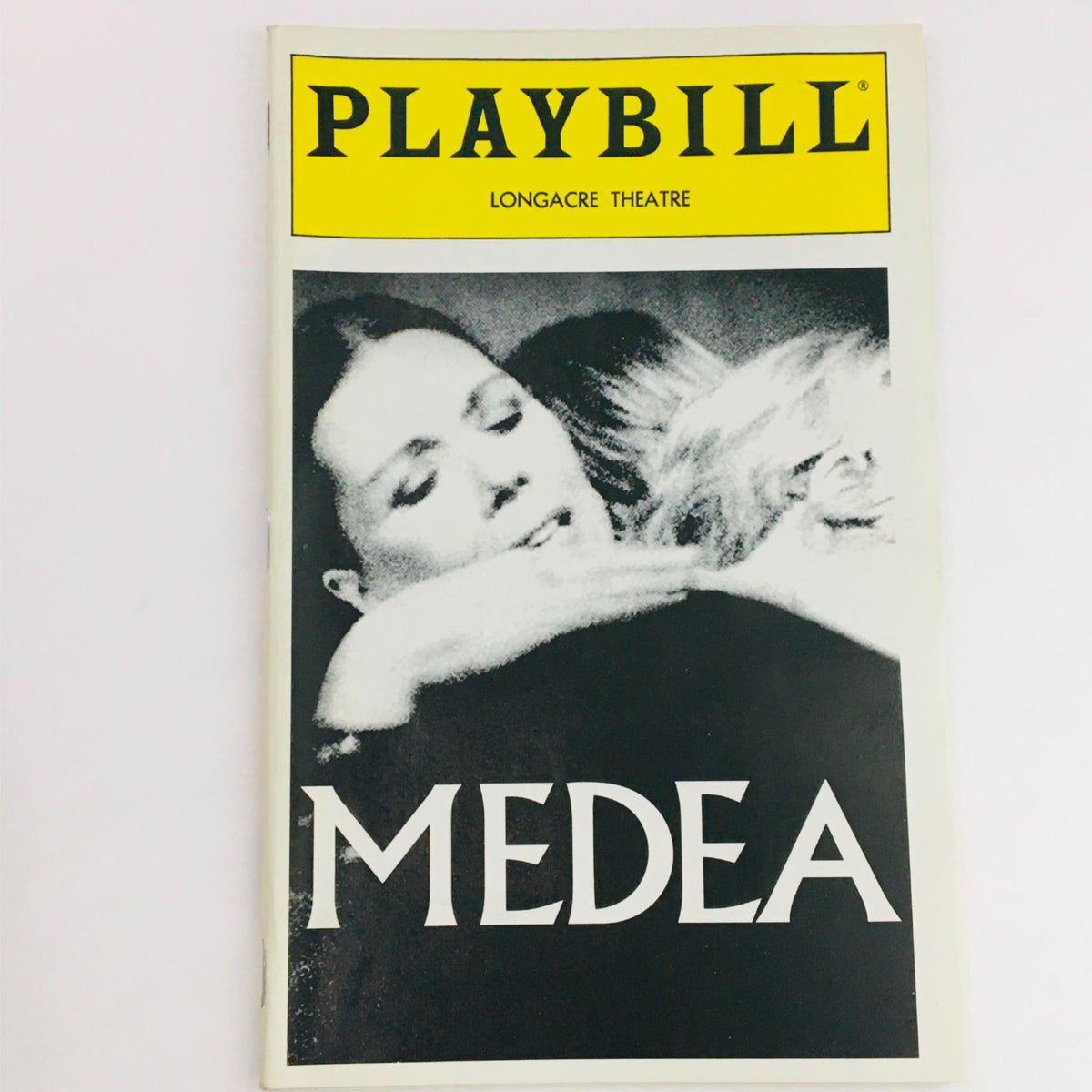 1994 Playbill for Medea directed by Jonathan Kent at Longacre Theatre, showcasing a black and white image of actors embracing on the cover.