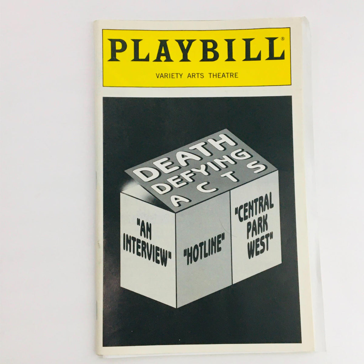 1995 Playbill for Death Defying Acts at Variety Arts Theatre featuring a unique cover design.