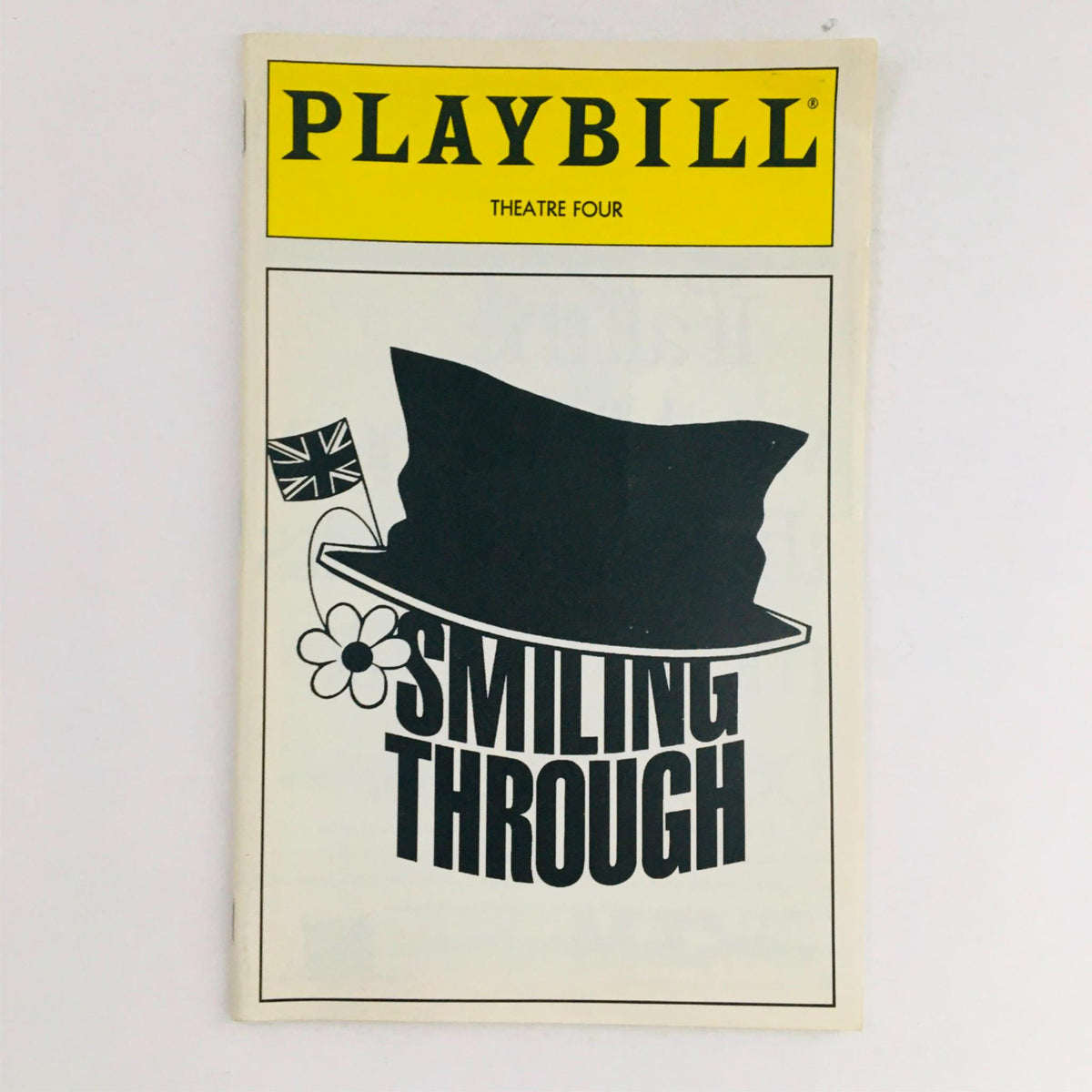 1994 Playbill for Smiling Through at Theatre 4 featuring a top hat and flower graphic.