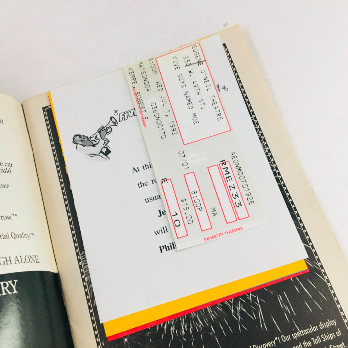 Close-up of the original ticket stubs for the 1992 Playbill 'Five Guys Named Moe' by Charles Augins, showcasing a vibrant theater experience at the Eugene O'Neill Theatre.