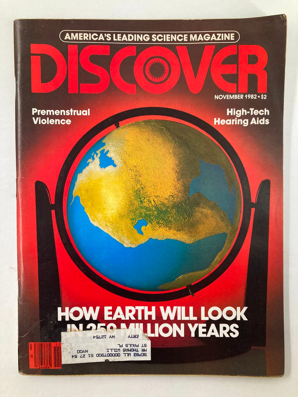 Cover of VTG Discover Magazine from November 1982 featuring articles on Premenstrual Violence and High-Tech Hearing Aids, with a striking design of Earth and bold title.