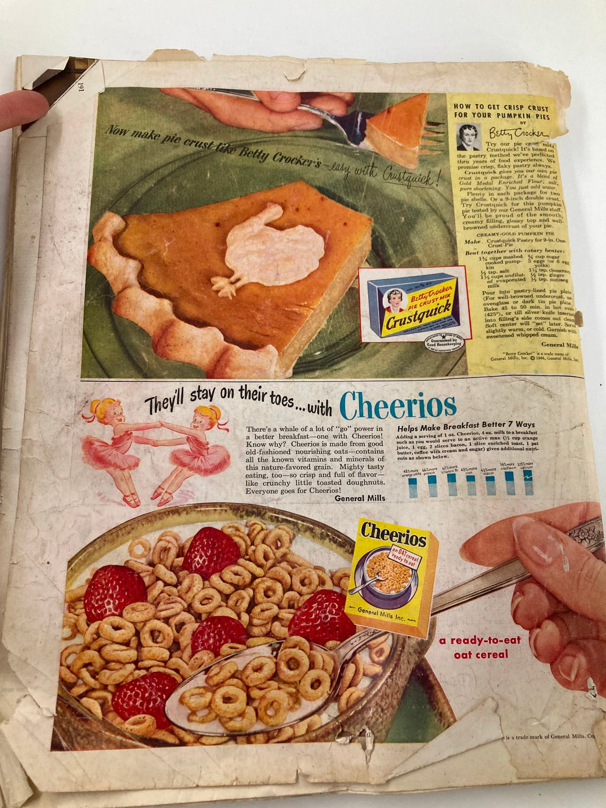 An advertisement for Cheerios from The Saturday Evening Post October 16, 1948, featuring a colorful pie and inviting text about the benefits of the cereal.