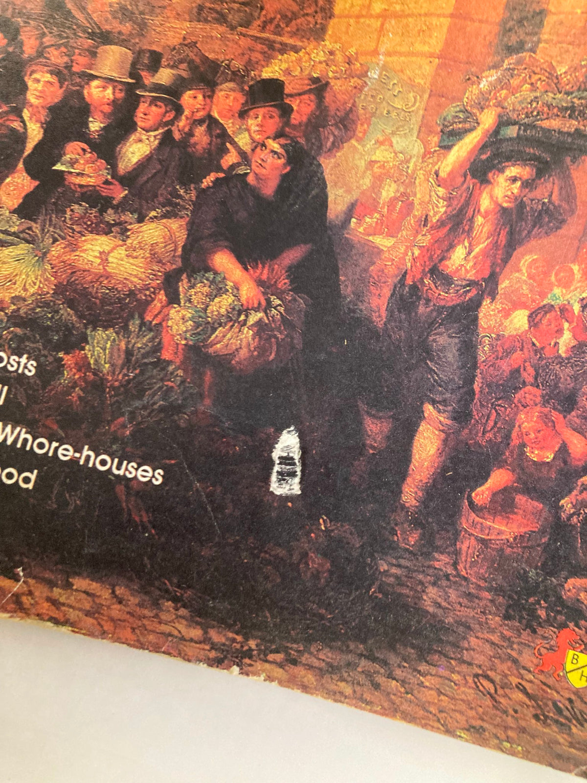 Close-up of damage on the cover of 'VTG Strange Stories from Covent Garden April 1982 The Bucket of Blood No Label', showcasing a tear on the image.