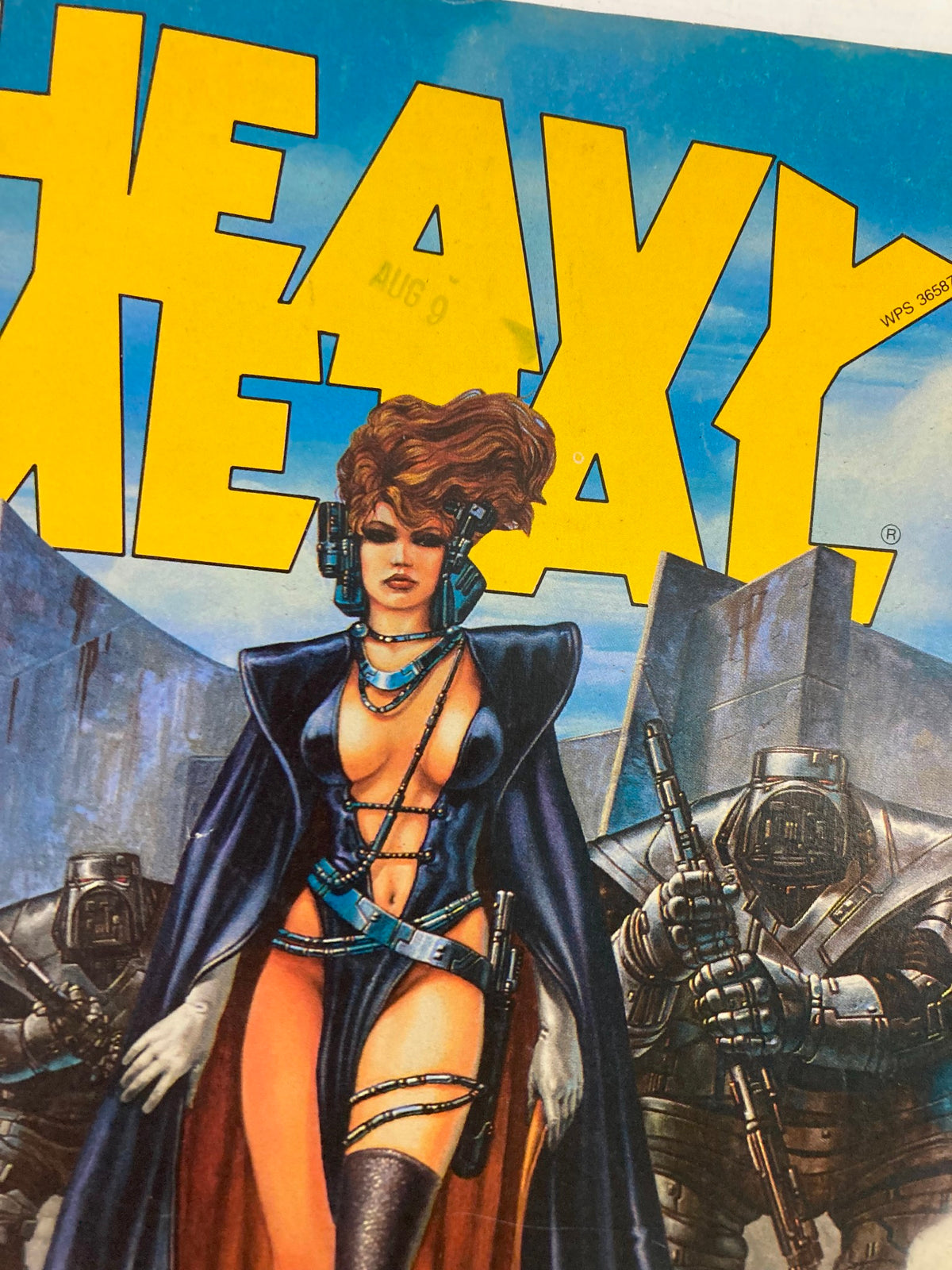 Close-up of the VTG Heavy Metal Magazine September 1984 cover highlighting the title and the female character, emphasizing the magazine's iconic illustration style.