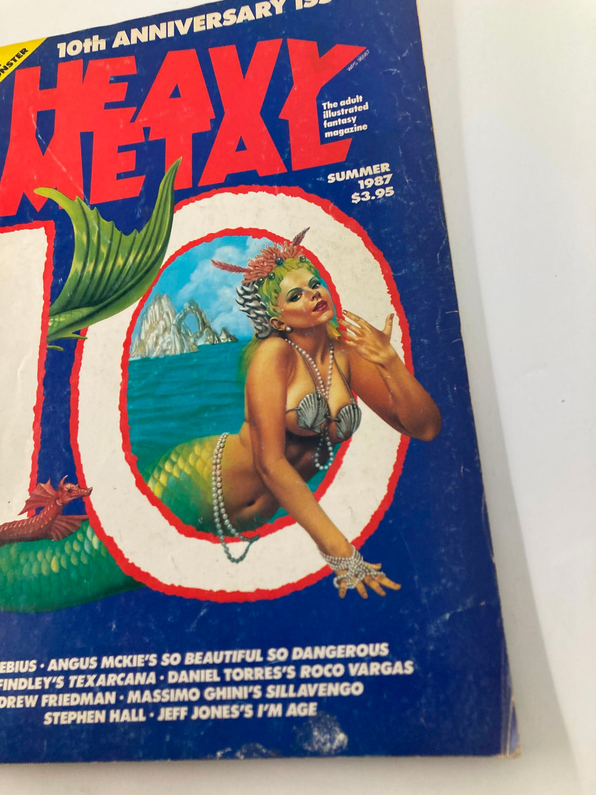 Cover of VTG Heavy Metal Magazine Summer 1987 Vol 11 #11 featuring a mermaid illustration by Rowena Morrill alongside bold text and vivid colors.