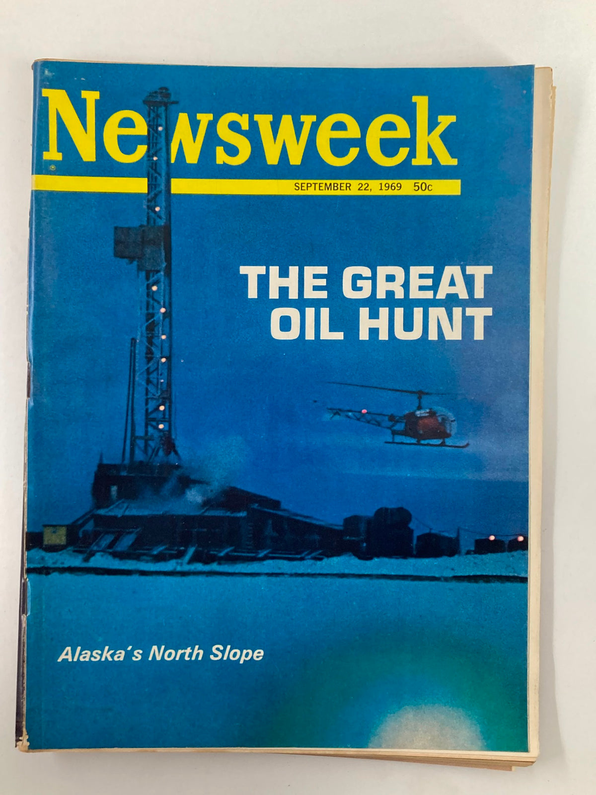 Cover of VTG Newsweek Magazine from September 22, 1969, featuring Alaska's North Slope and titled 'The Great Oil Hunt'. The cover showcases an oil rig and helicopter against a blue background.
