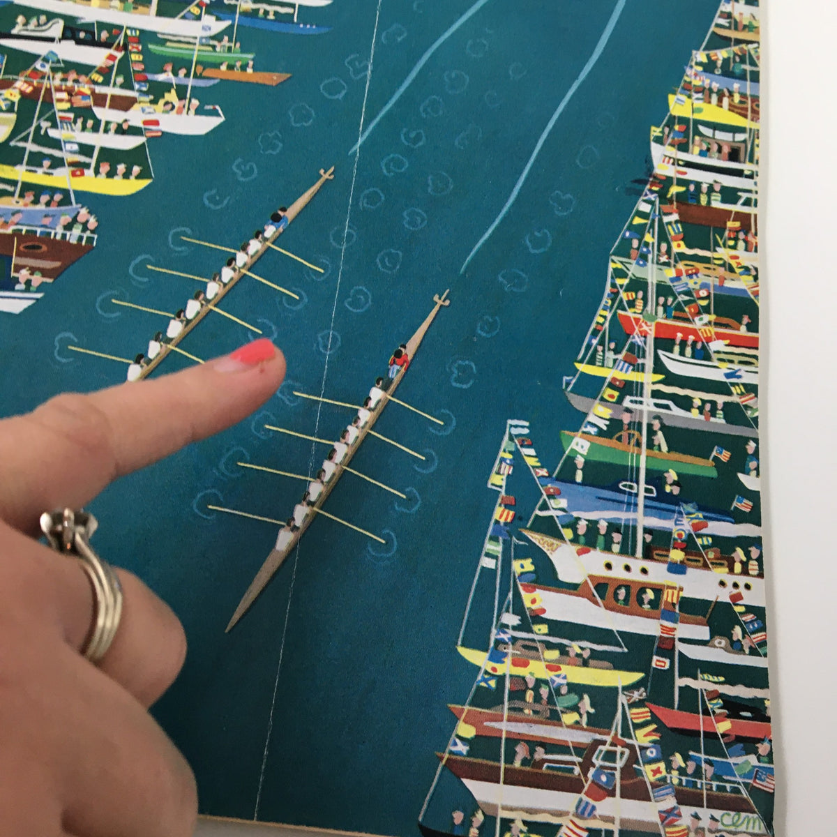 An illustration from The New Yorker Full Magazine May 27 1961 titled 'Boat Festival' by Charles E. Martin, showcasing rowing boats and vibrant docks filled with colorful flags and people.