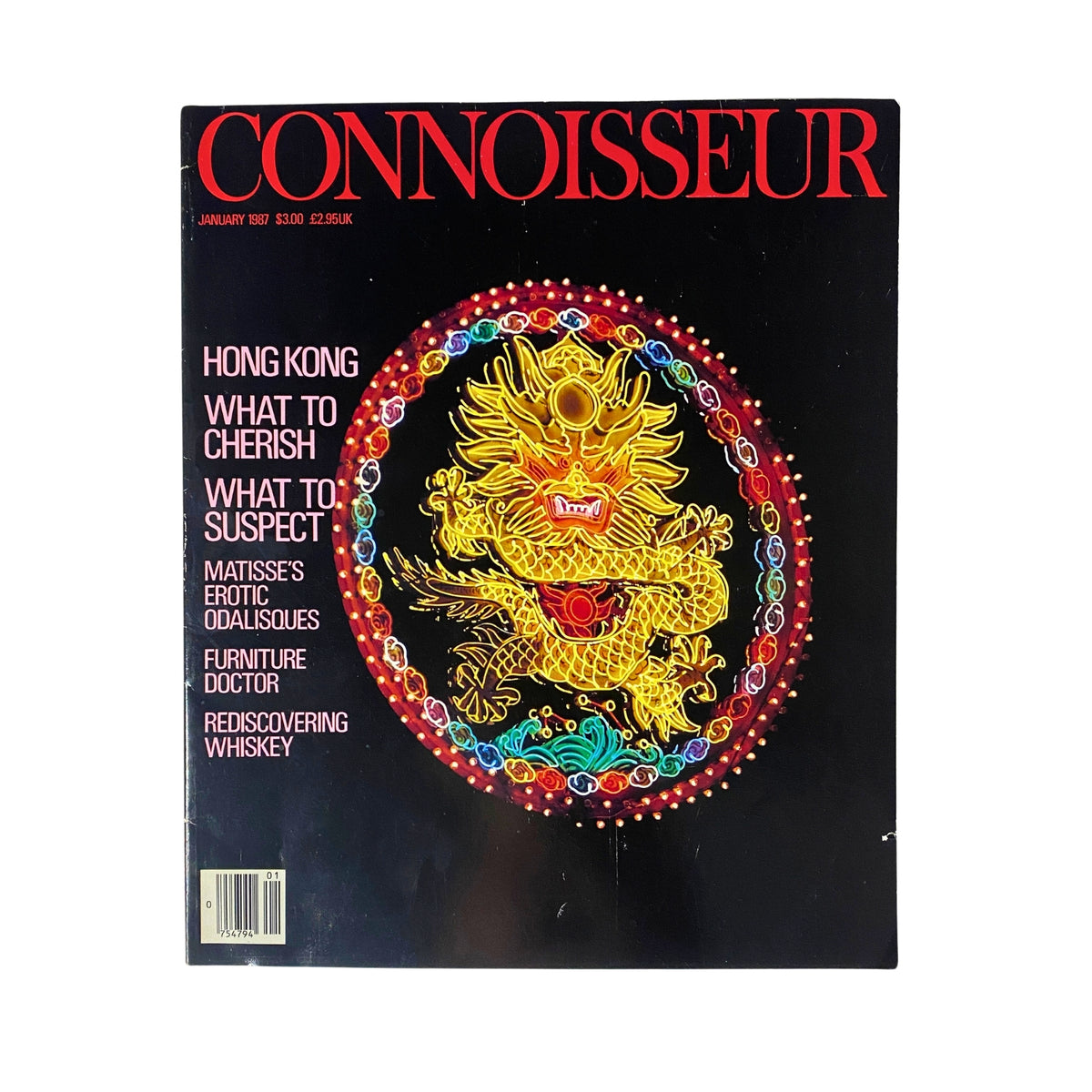 Cover of 'Connoisseur Magazine January 1987' featuring vibrant artwork of a dragon emblem, highlighting topics such as Hong Kong, Matisse's Odalisques, and rediscovering whiskey.