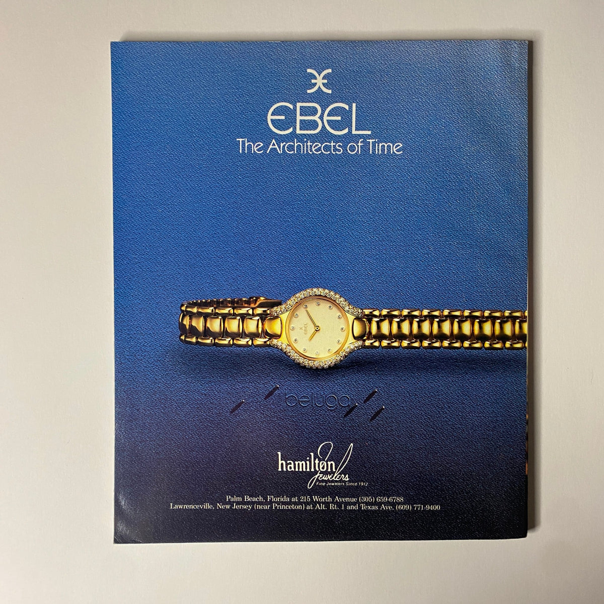 Back cover of Connoisseur Magazine, May 1986, featuring a luxury Ebel watch, captioned 'The Architects of Time', set against a blue background, showcasing elegance and sophistication.