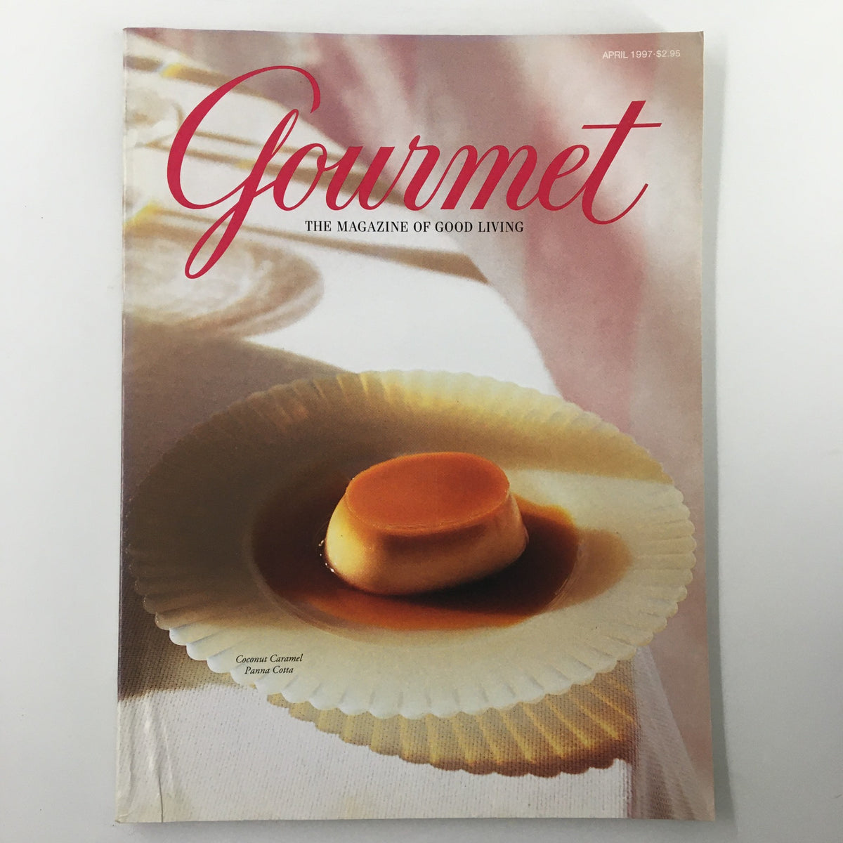 Gourmet Magazine April 1997 featuring Coconut Caramel Panna Cotta on the cover, showcasing an elegant dessert photograph with the magazine title and tagline 'The Magazine of Good Living'.