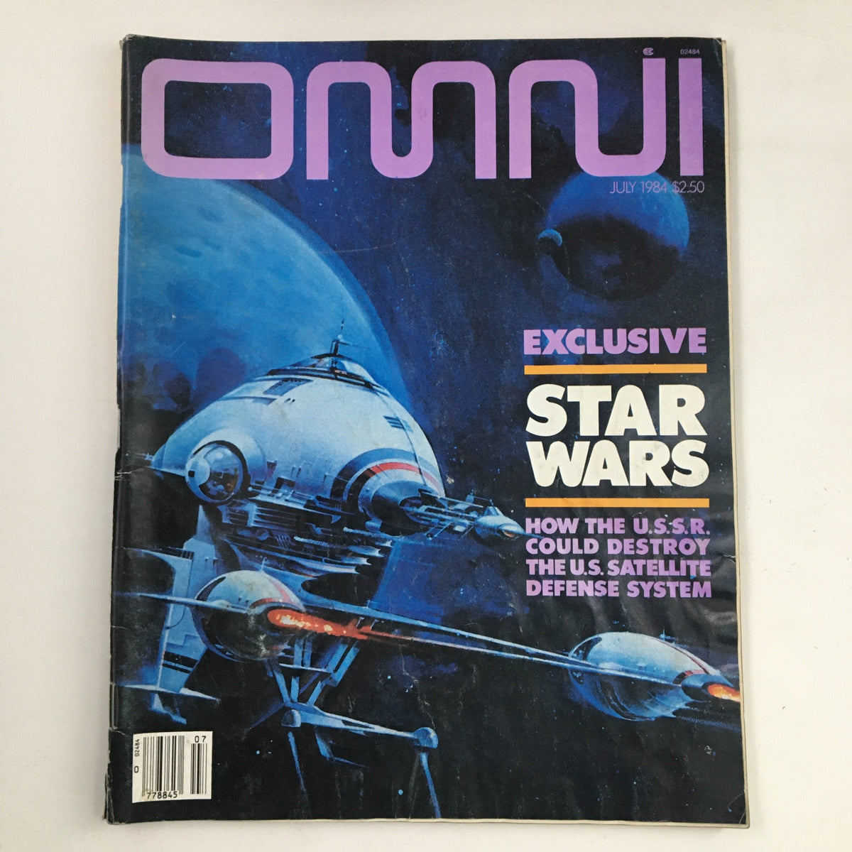 Omni Magazine July 1984 cover featuring exclusive Star Wars content and an article on the U.S. Satellite Defense System, showcasing a futuristic spaceship design and space theme.