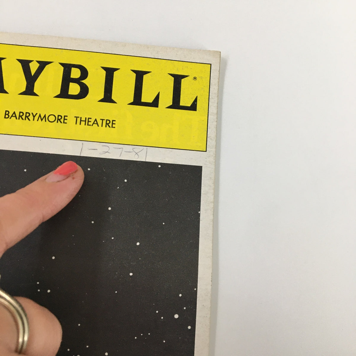 Close-up of the 1981 Playbill for 'Lunch Hour' at Ethel Barrymore Theatre, showing the date '1-27-81' handwritten on the cover.