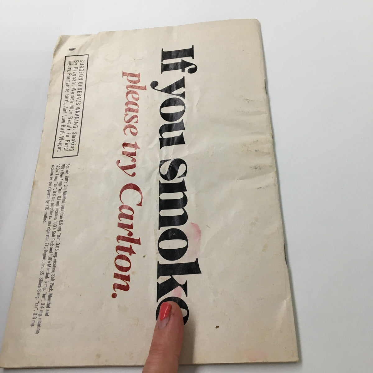 Back cover of the 1983 Playbill for La Cage Aux Folles, featuring an advertisement with the text 'If you smoke please try Carlton'.