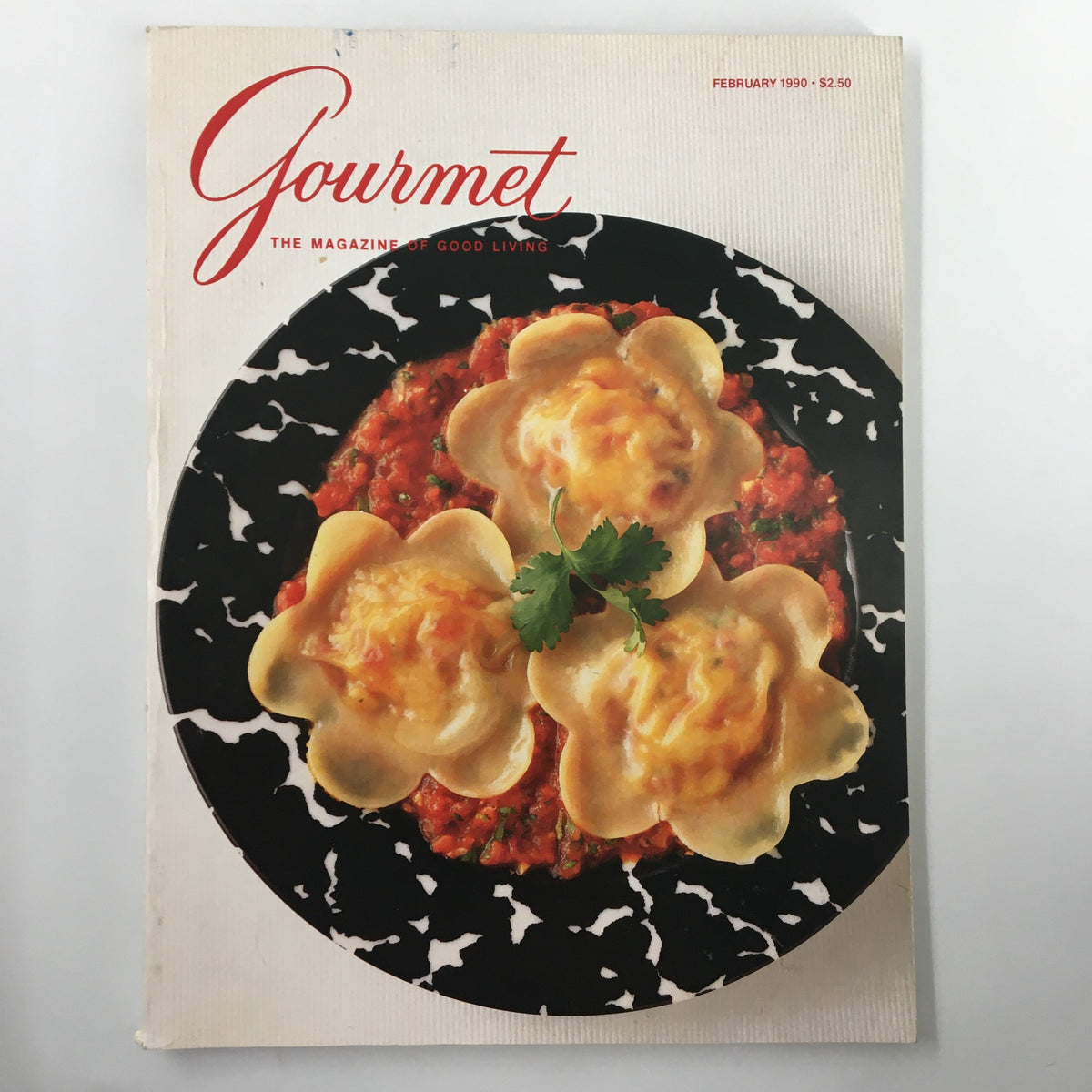 Cover of Gourmet Magazine February 1990 featuring a dish with pasta flowers and red sauce, showcasing the magazine's focus on gourmet cuisine.